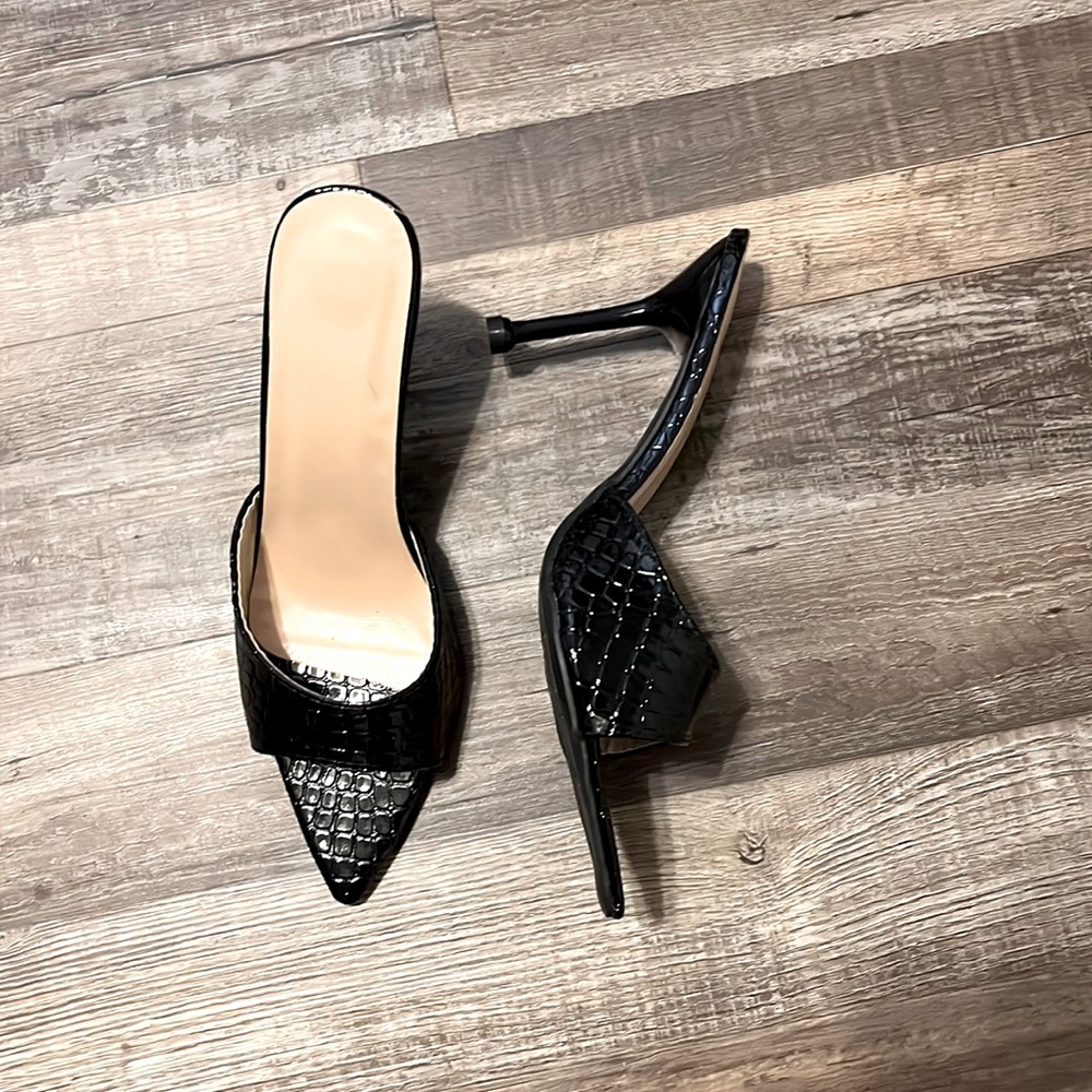 Black pointed toe heels